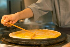 Preparing French crepes 